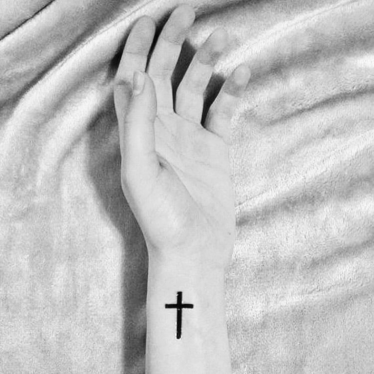 white cross tattoos on wrist