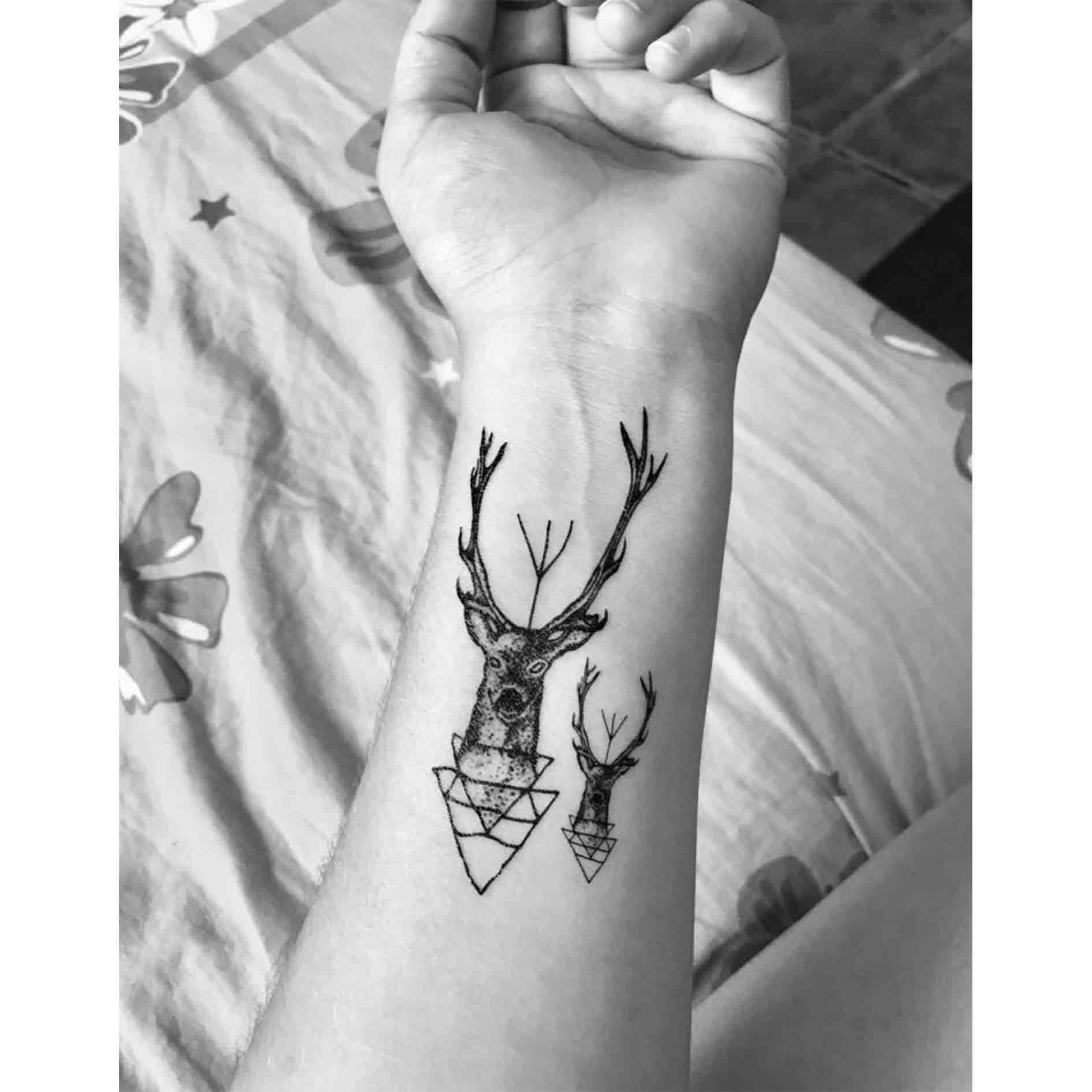 Tattoo uploaded by Claire • By #koraykaragozler #watercolor #geometric #deer  #stag • Tattoodo