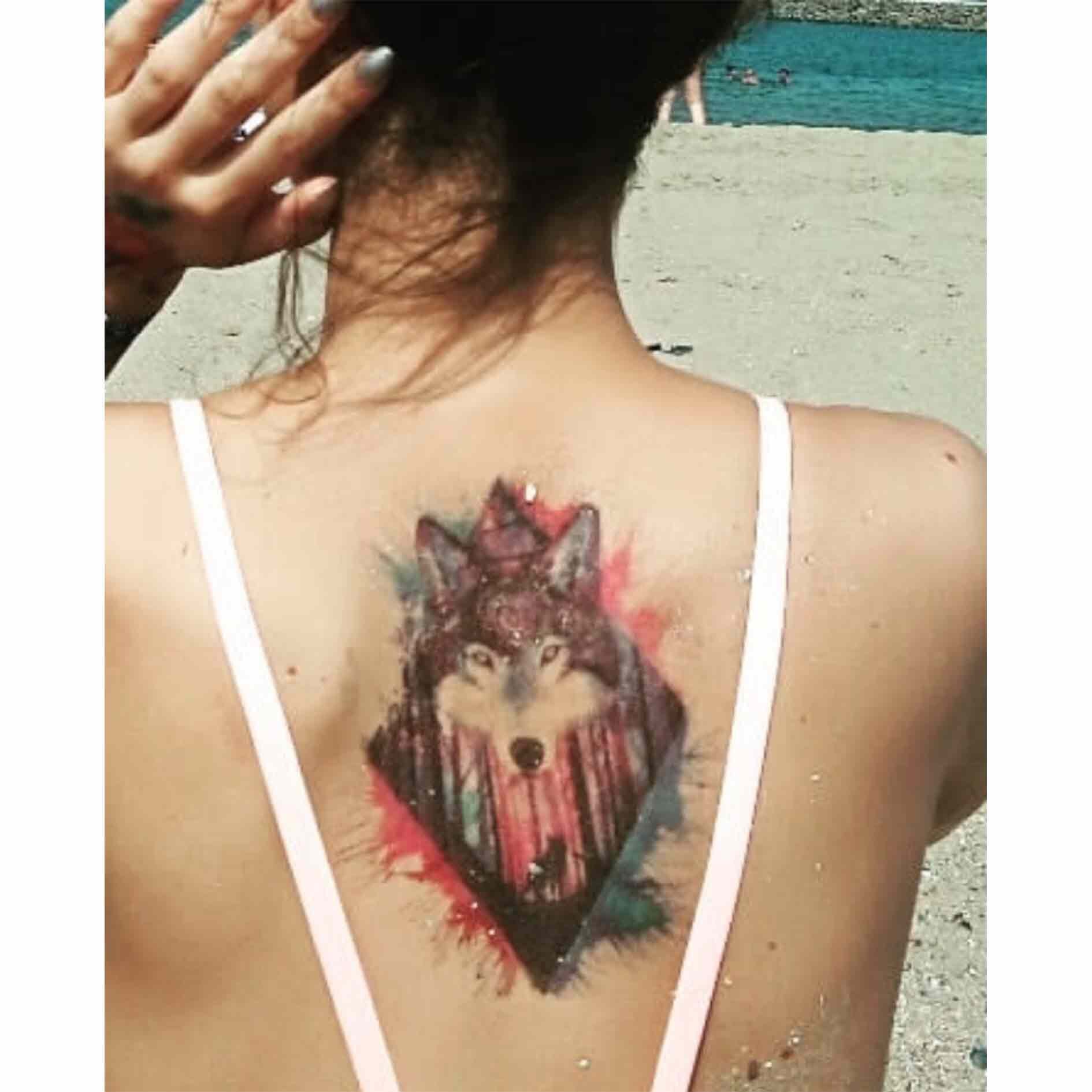 realistic wolf tattoo on neck