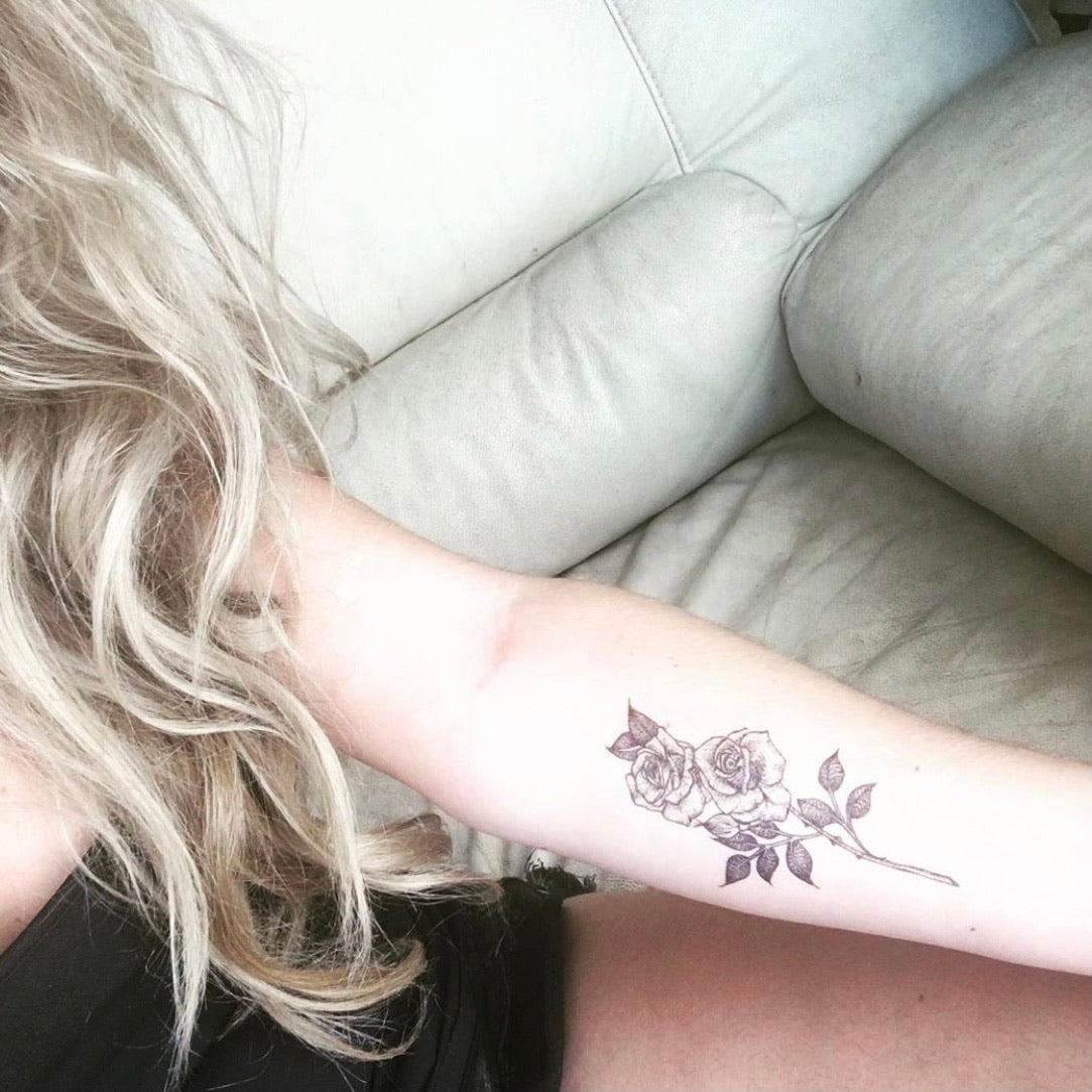 rose tattoo upper arm